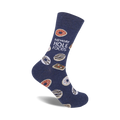 A navy blue crew sock with a playful 'Eat More Hole Foods' slogan and illustrated donuts in various colors and glazes.