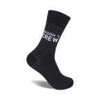 Black crew socks with thin grey stripes and 'Groom's Crew' written in white.  A stylish and fun sock for weddings or any occasion.