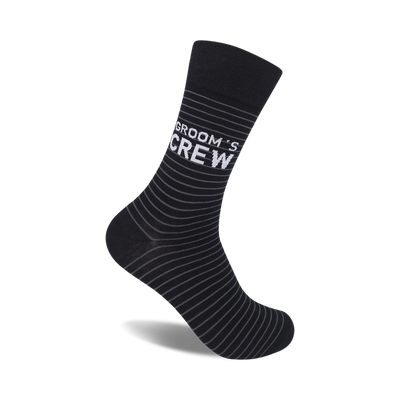 black and grey crew sock has white '{groom's crew}' text and is made for the groom's crew for the wedding.  