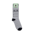 A lifestyle shot showing the socks on a foot. The grey and black color scheme is clearly visible. The text on the socks is legible.  