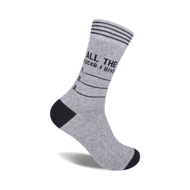 gray crew socks with black text that reads "all the fucks i give". three empty lines below for you to fill. funny and sarcastic.  