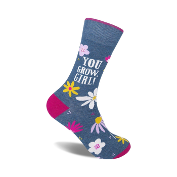 blue crew socks with pink toe, heel, and top feature white and yellow flowers and "you grow, girl!" in pink and white.  