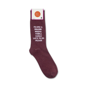 A pair of maroon socks with white text that reads: 