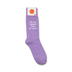 A pair of purple socks with white text that reads: 