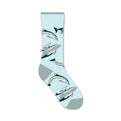 womens light blue crew socks with pattern of dark blue/grey dolphins.  