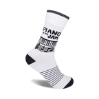 White crew socks with black piano keys, musical notes, and stripes. 'Piano Is My Jam' text is featured.