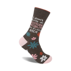 Brown crew socks with a pink cuff, featuring a sassy message and teal, pink, and white floral accents.