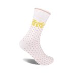 White crew socks with pink polka dots and 'Bride's Bestie' in gold lettering. A perfect gift for bridesmaids!
