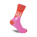 Coral and pink crew socks featuring the text 'I MAKE BAD DECISIONS' and a lightning bolt graphic.