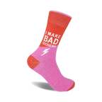Coral and pink crew socks featuring the text 'I MAKE BAD DECISIONS' and a lightning bolt graphic.