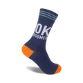 A navy blue crew sock with orange heel and toe. White 'OK BOOMER' text is prominently displayed.