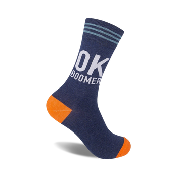 blue socks with "ok boomer" text on the leg, three blue stripes at top, orange toe and heel.  