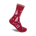 Red crew socks with a whimsical design. Features white gnomes, snowflakes, and hearts on a red background. Perfect for adding a touch of festive fun to any outfit!