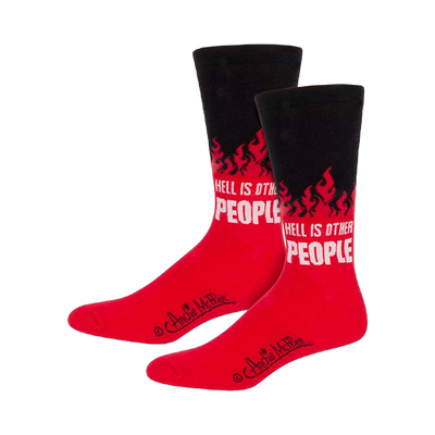 A pair of crew socks in red and black.  The socks feature a design of flames and the text 'Hell is Other People'.