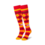 Pair of red and gold knee-high socks with a Cheez-It-inspired design. Features horizontal stripes and diamond patterns.