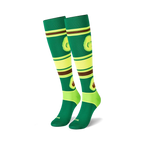 Pair of knee-high socks with avocados and stripes in green, lime, and brown. Fun and quirky design.