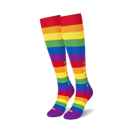 rainbow-themed knee-high pride socks with rainbow-colored "pride" lettering. unisex sizing.   