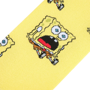 A close up of yellow socks with a repeating pattern of a cartoon character, SpongeBob SquarePants, with his mouth open in a screaming expression.