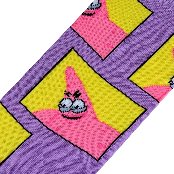 A close up of a pair of purple socks with a repeating pattern of cartoon character Patrick Star in yellow squares.