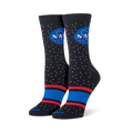 Upright black socks showing the classic NASA logo, white stars, and bold red and blue stripes near the toe.