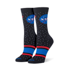 Upright black socks showing the classic NASA logo, white stars, and bold red and blue stripes near the toe.