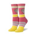 Pair of women's crew socks in pink and yellow stripes. The socks feature a retro Warheads logo with cartoon character.