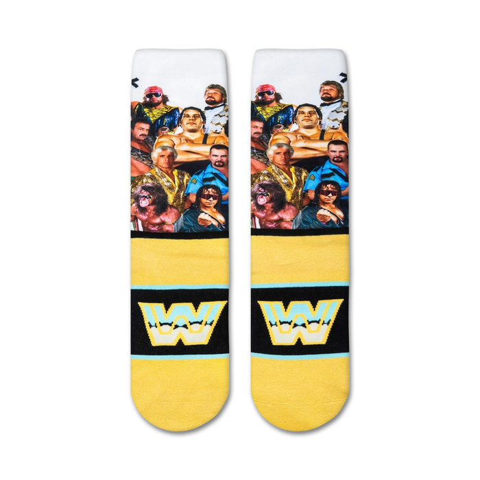 A pair of white socks with a pattern of wrestlers from the 1980s and 1990s on them. The socks have yellow cuffs with the letter 