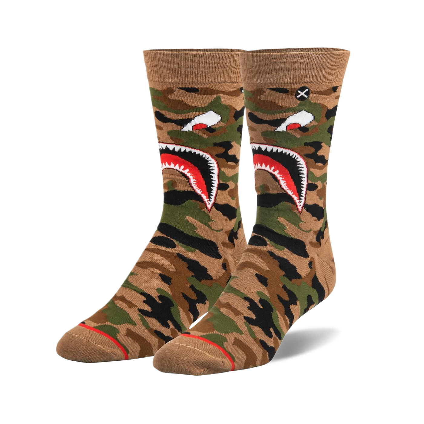 Pair of crew socks in tan, green, and black camouflage pattern.  A large shark mouth graphic is featured prominently.