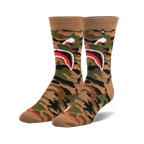 Pair of crew socks in tan, green, and black camouflage pattern.  A large shark mouth graphic is featured prominently.