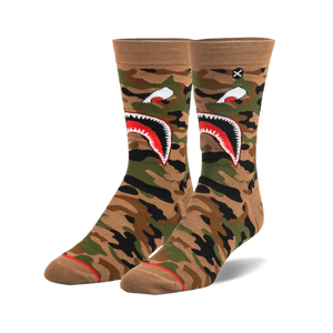 Pair of crew socks with brown, green, and black warplane camouflage. Features a white shark mouth design with red details.