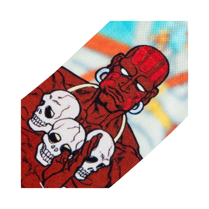 Close-up detail shot of Dhalsim's face and skull imagery on the sock.