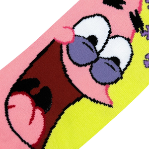 A close up of a pink and yellow sock with a cartoon character, Patrick Star from Spongebob Squarepants, on it.