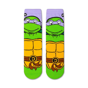 A close up of a sock with the face of Donatello from Teenage Mutant Ninja Turtles. Donatello is a turtle with green skin and a purple mask. He is smiling with his eyes closed.