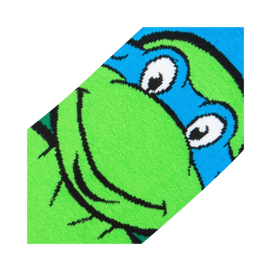 Close-up detail shot of Leonardo's face on the TMNT socks, highlighting the intricate design.