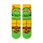 Pair of Michelangelo Teenage Mutant Ninja Turtles socks shown against a white background.