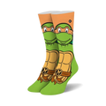 Crew socks in green and orange, featuring Michelangelo's face and shell from Teenage Mutant Ninja Turtles.  The 'M' is visible on his belt.