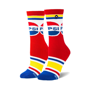 A pair of mid-calf socks with retro Pepsi logos on a red background, featuring red, white, blue, and yellow stripes.
