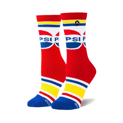 A pair of mid-calf socks with retro Pepsi logos on a red background, featuring red, white, blue, and yellow stripes.