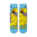 Flat lay showcasing a pair of Rugrats Reptar crew socks. The socks feature a light blue background with a yellow Reptar design.