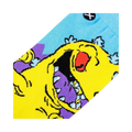 Close-up detail shot of the Rugrats Reptar sock design, highlighting the vibrant yellow, purple, and light blue colors.