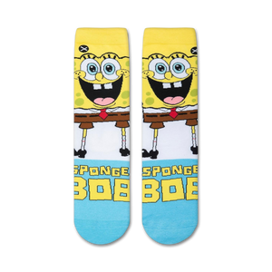 A pair of yellow and white socks with the cartoon character SpongeBob SquarePants on them. The socks have a blue toe and heel.