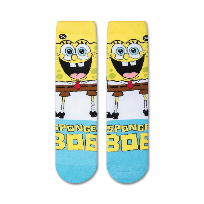 A pair of yellow and white socks with the cartoon character SpongeBob SquarePants on them. The socks have a blue toe and heel.