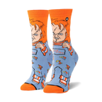 Pair of Chucky 'Good Guys' crew socks. Orange cuffs, blue body with Chucky image and knife pattern.