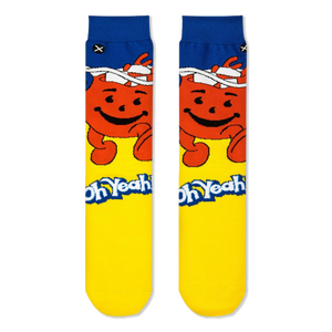 Flat front view of Kool-Aid crew socks with a blue cuff, smiling red pitcher, yellow foot, and the Oh Yeah catchphrase.