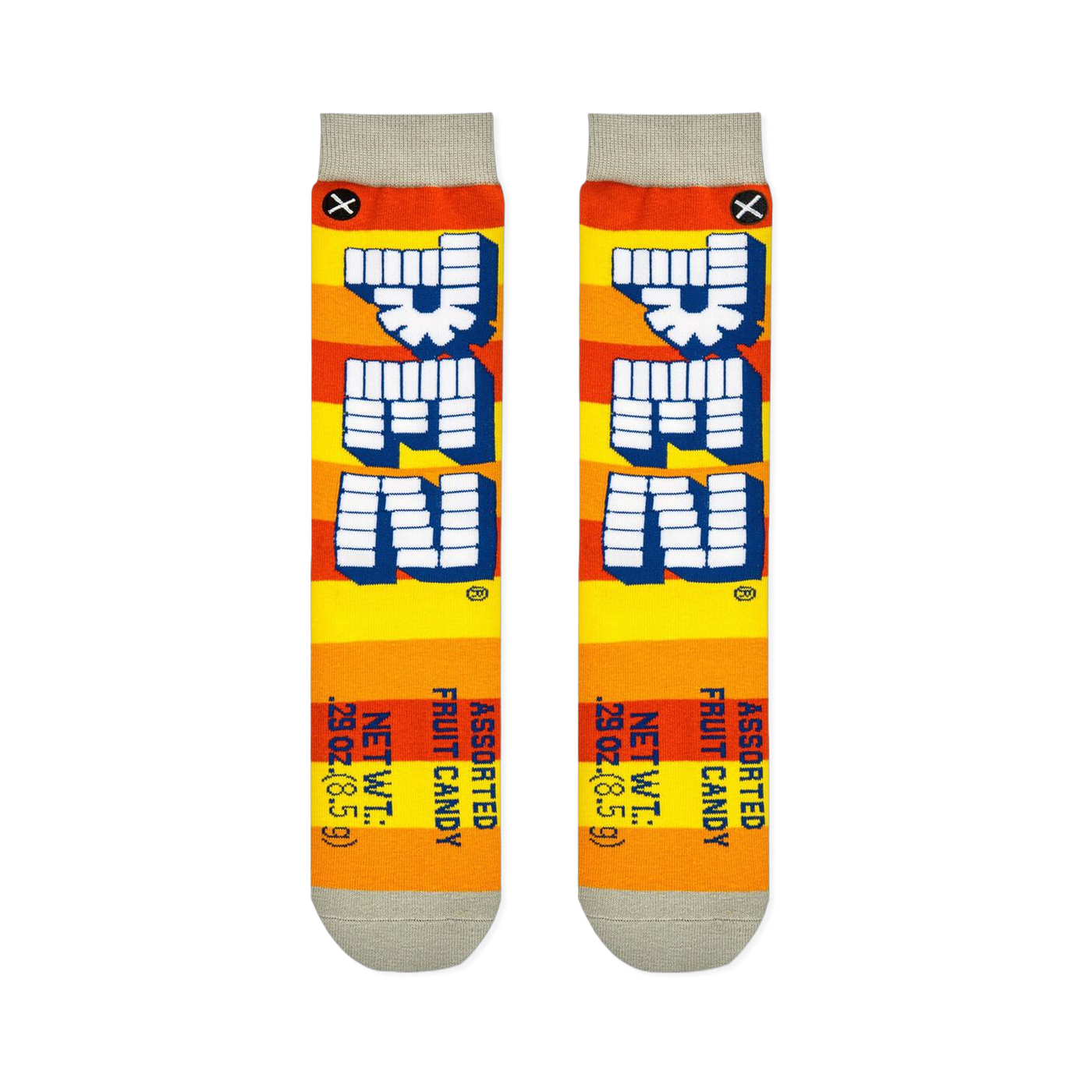 Flat lay of two Pez socks showing orange and yellow stripes, vertical block logos, and printed net weight details at the toe.
