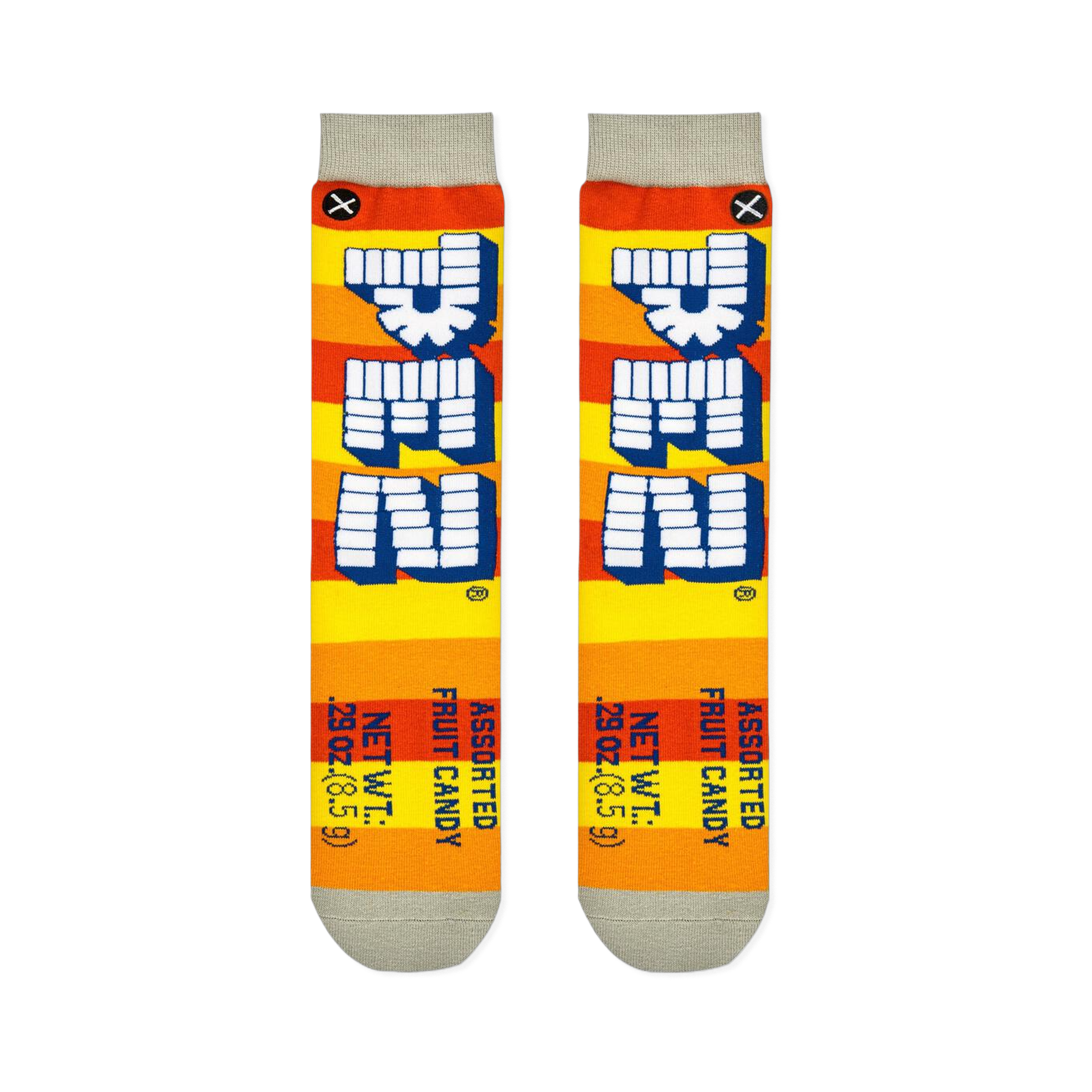 Flat lay of two Pez socks showing orange and yellow stripes, vertical block logos, and printed net weight details at the toe.