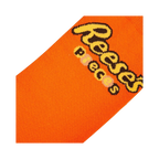 Close-up detail shot of the Reese's Pieces logo on the orange part of the sock.