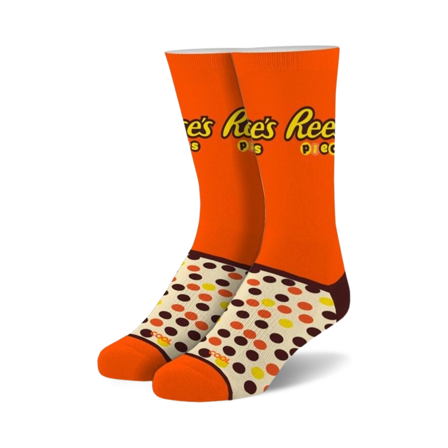 Pair of orange crew socks with Reese's Pieces logo and brown, yellow, and orange polka dots. 
