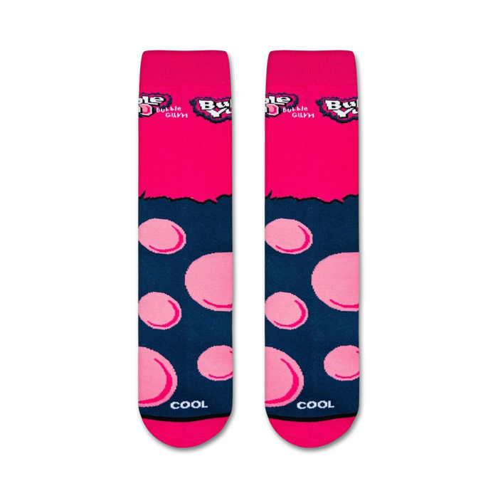 A pair of pink socks with a repeating pattern of light blue bubblegum balls and the word 