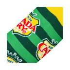 Close-up detail shot highlighting the Canada Dry logo and stripe pattern on the socks.